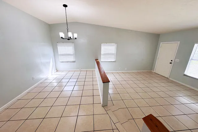 a view of an empty room and window