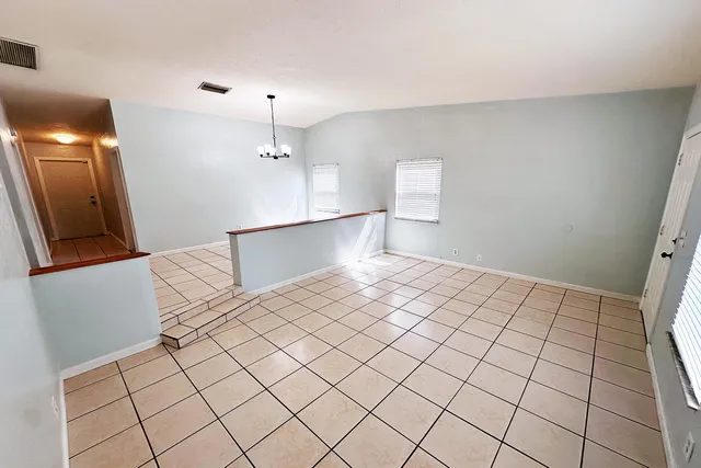 a spacious bathroom with a shower