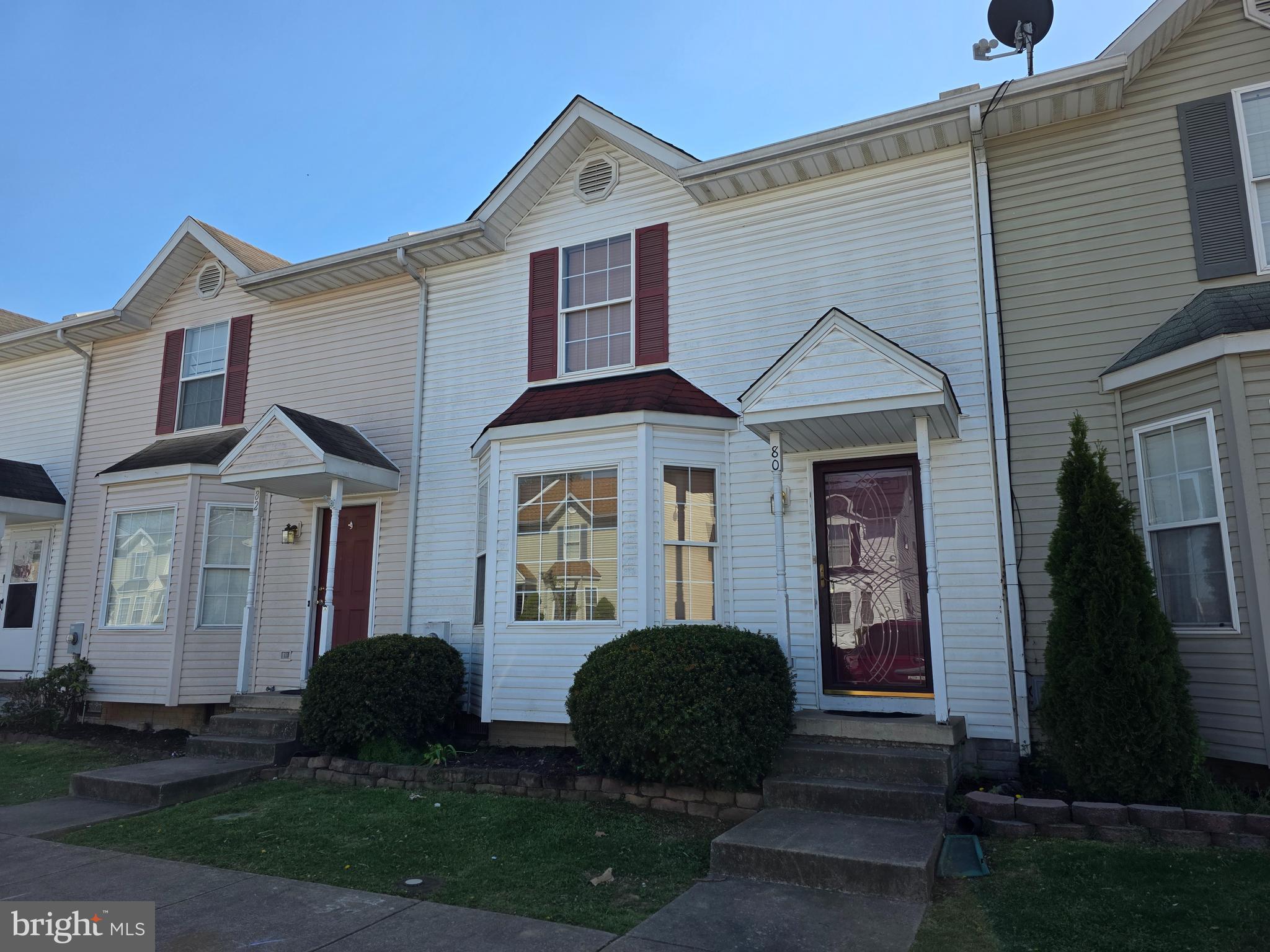 80 Stadium Circle Inwood, WV 25428 - Photo 1 of 53 a front view of a house with garden