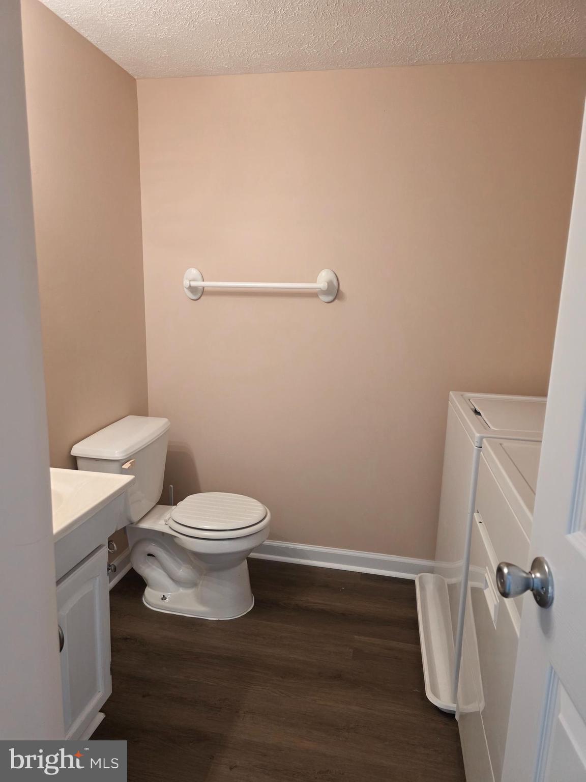 80 Stadium Circle Inwood, WV 25428 - Photo 12 of 53 a white toilet sitting next to a shower