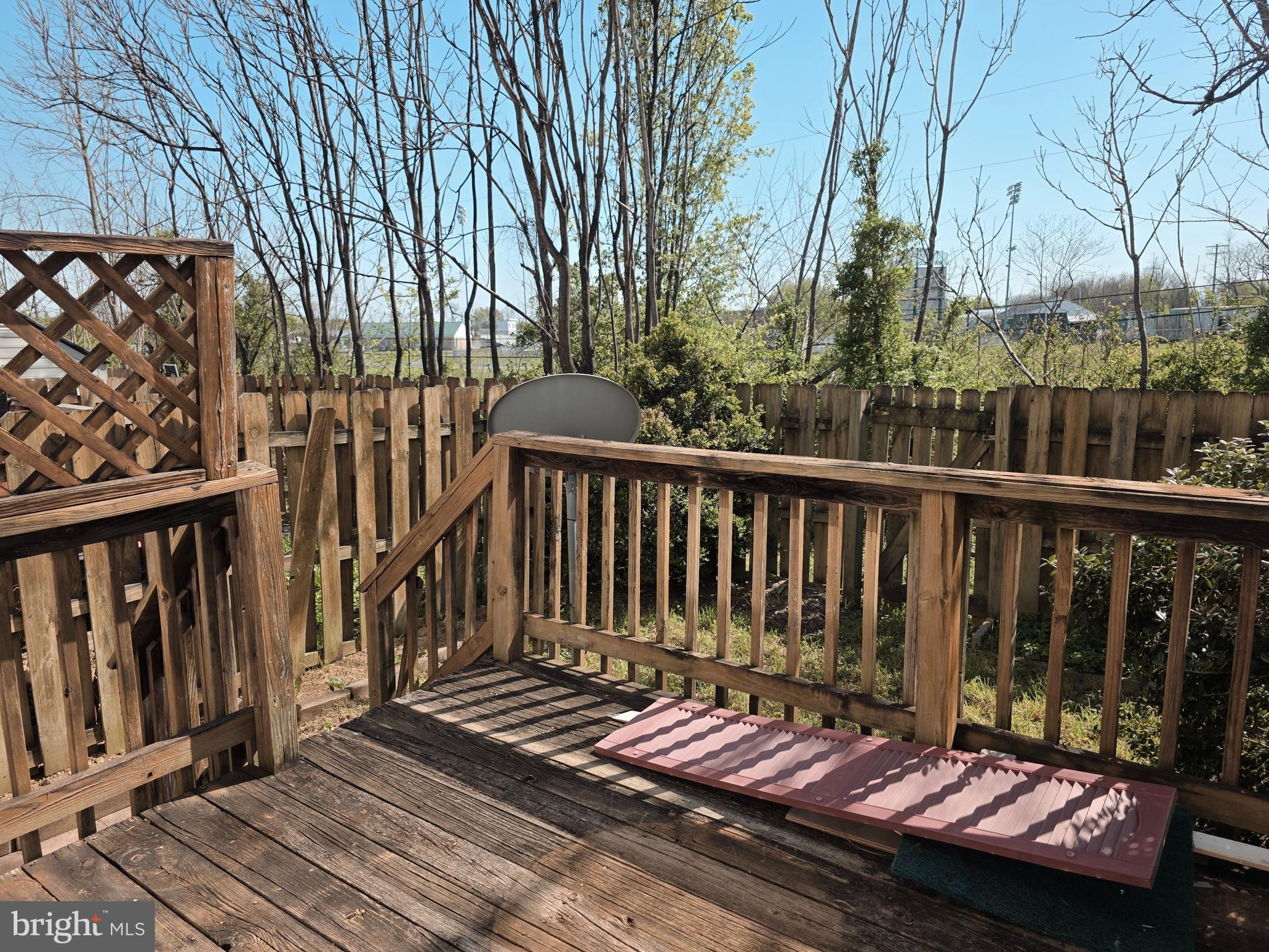 80 Stadium Circle Inwood, WV 25428 - Photo 16 of 53 a view of balcony with wooden floor and fence