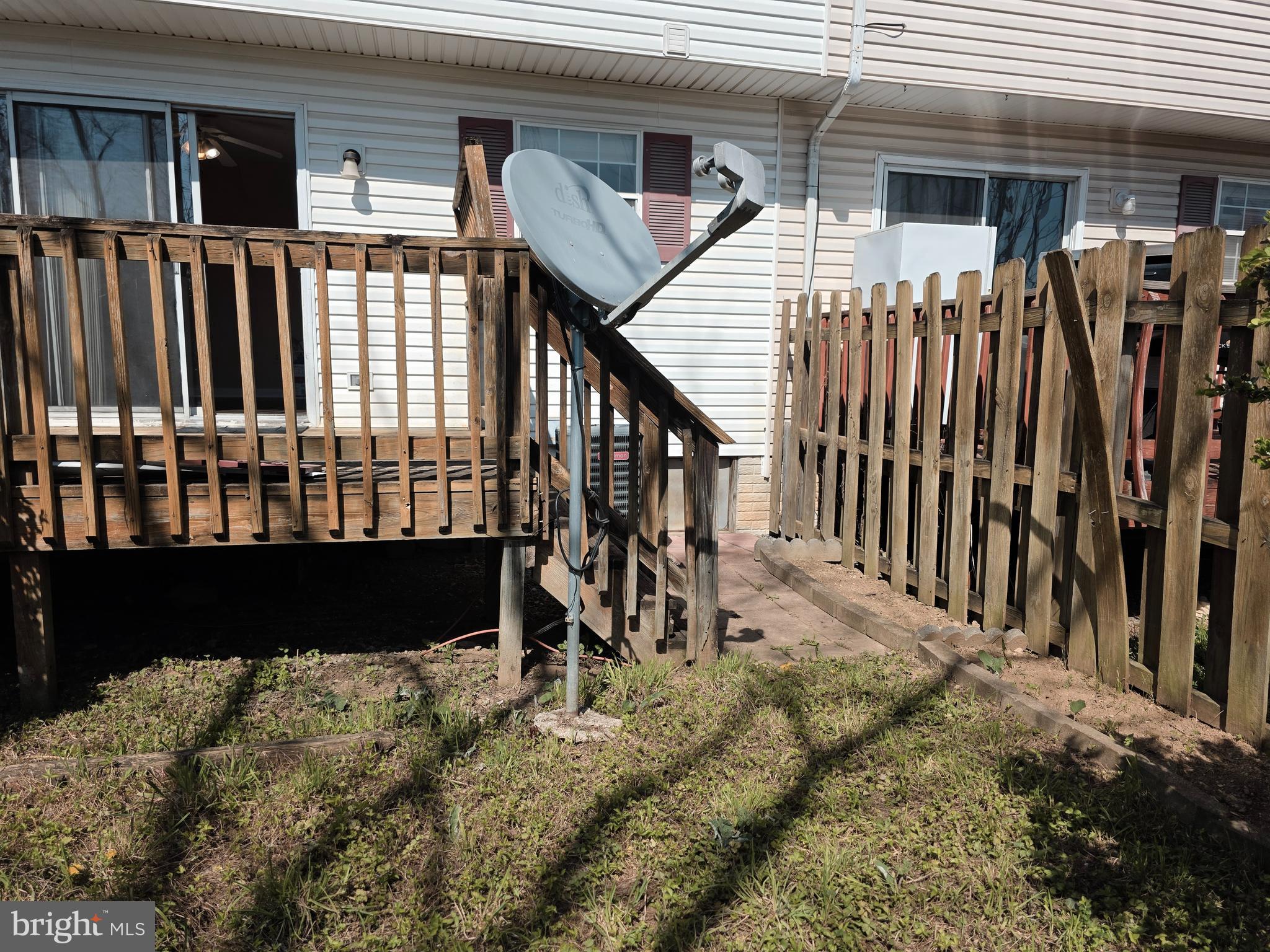 80 Stadium Circle Inwood, WV 25428 - Photo 19 of 53 a view of a house with backyard and deck