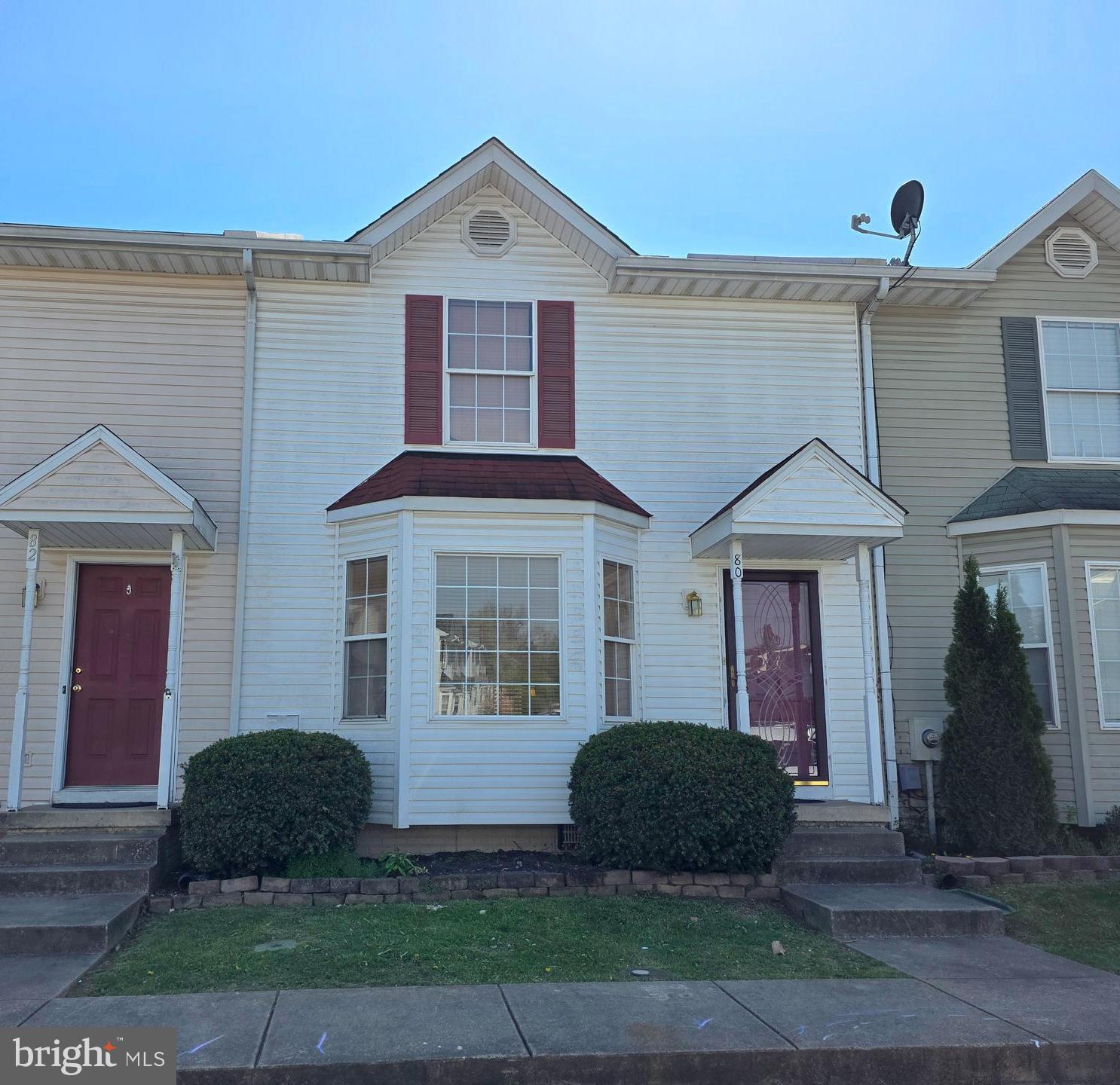 80 Stadium Circle Inwood, WV 25428 - Photo 2 of 53 a front view of a house with a yard