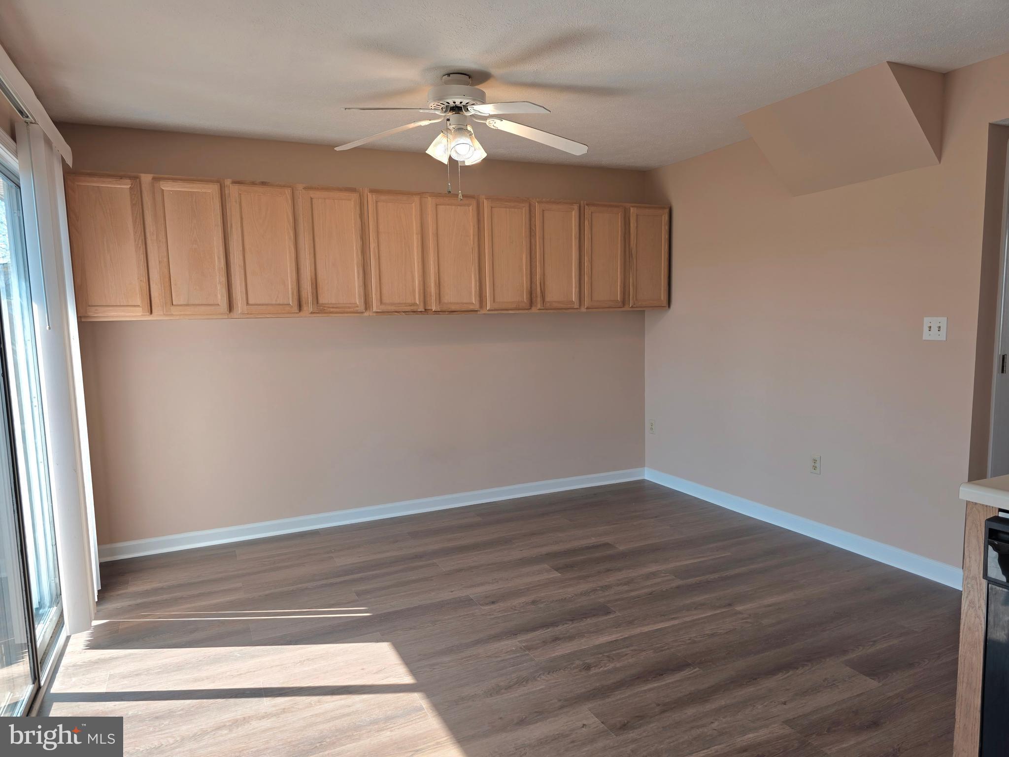 80 Stadium Circle Inwood, WV 25428 - Photo 27 of 53 wooden floor in an empty room with a window