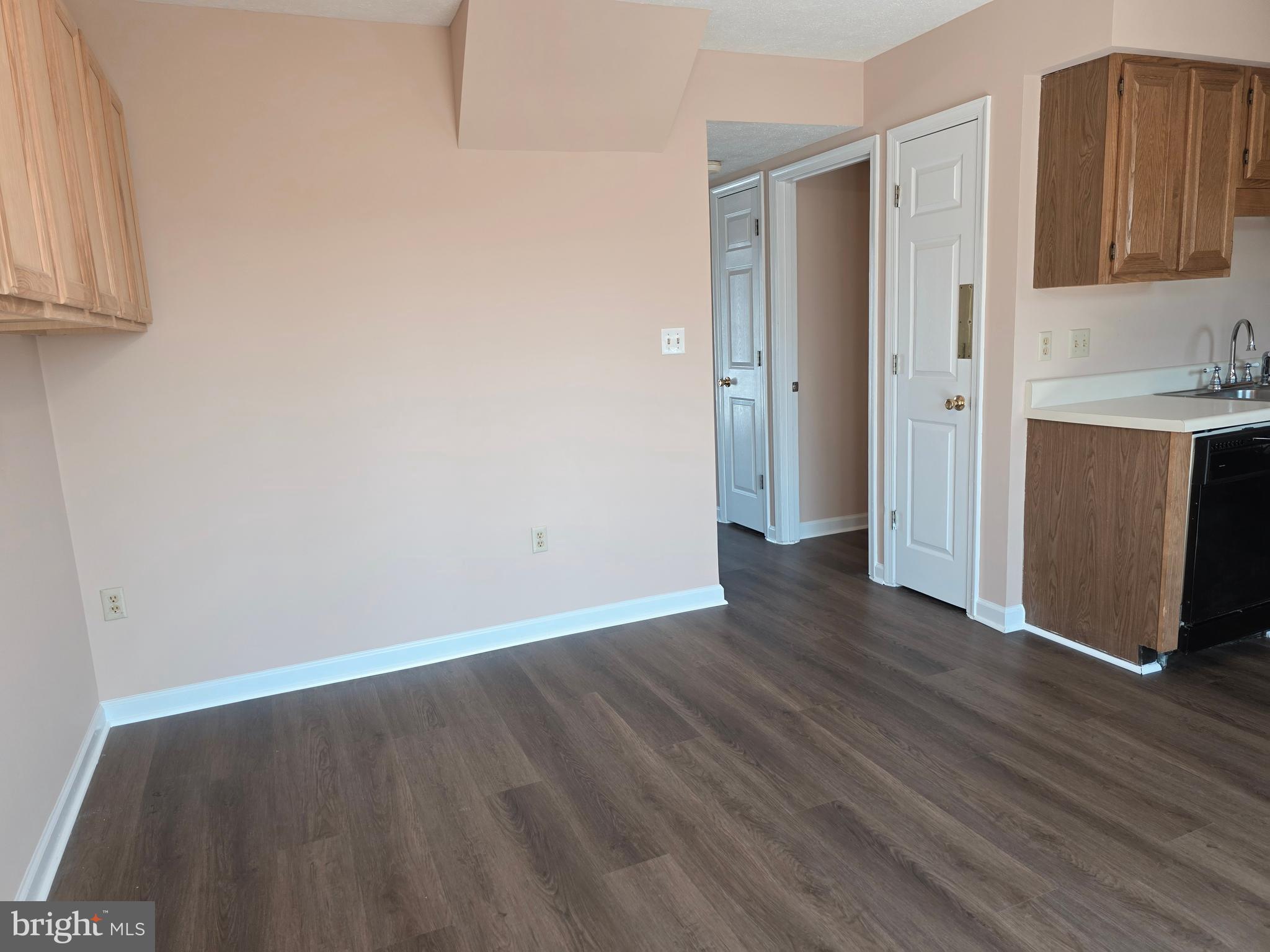 80 Stadium Circle Inwood, WV 25428 - Photo 29 of 53 a view of an empty room with wooden floor and a window
