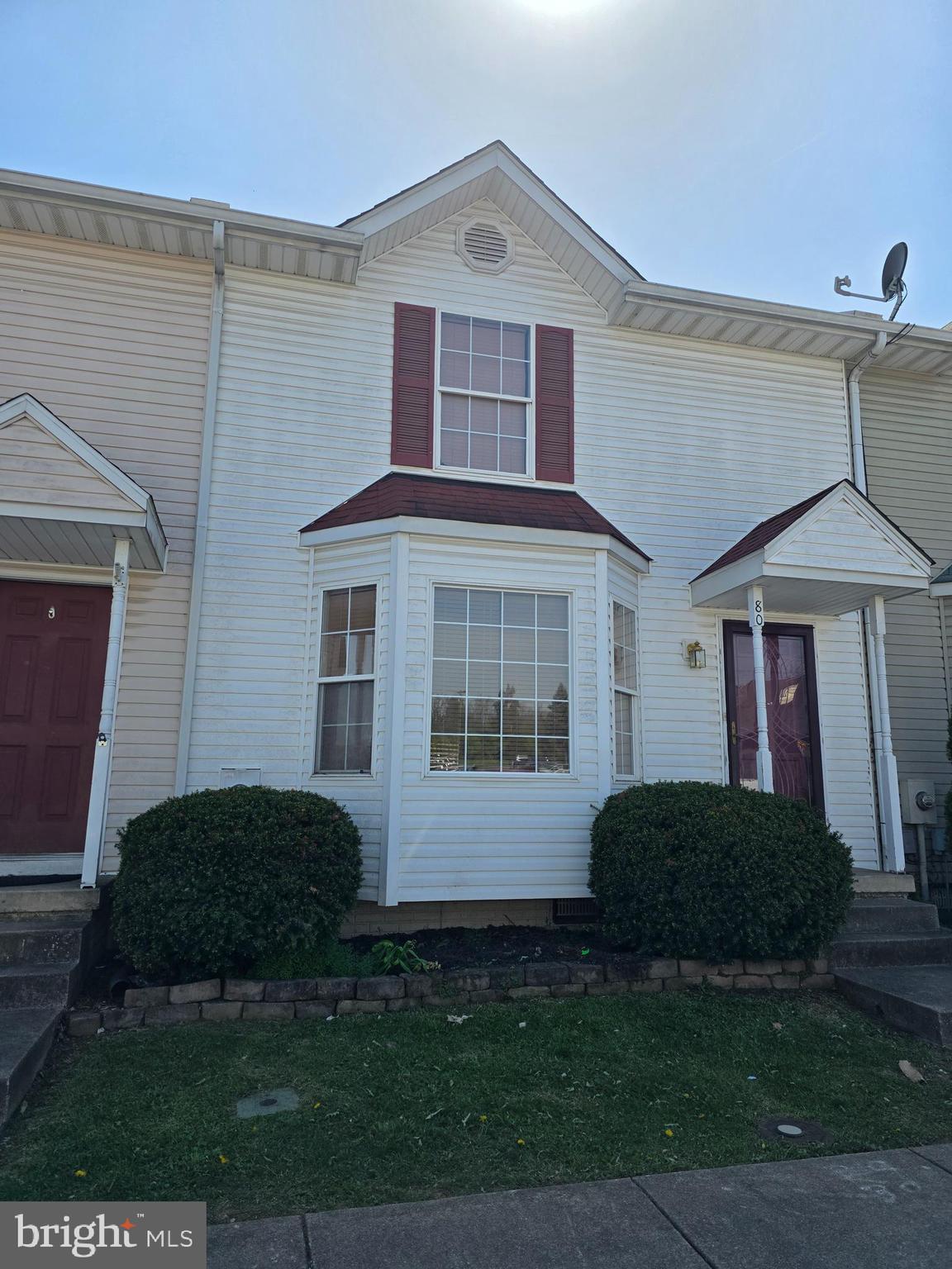 80 Stadium Circle Inwood, WV 25428 - Photo 3 of 53 a front view of a house with garden
