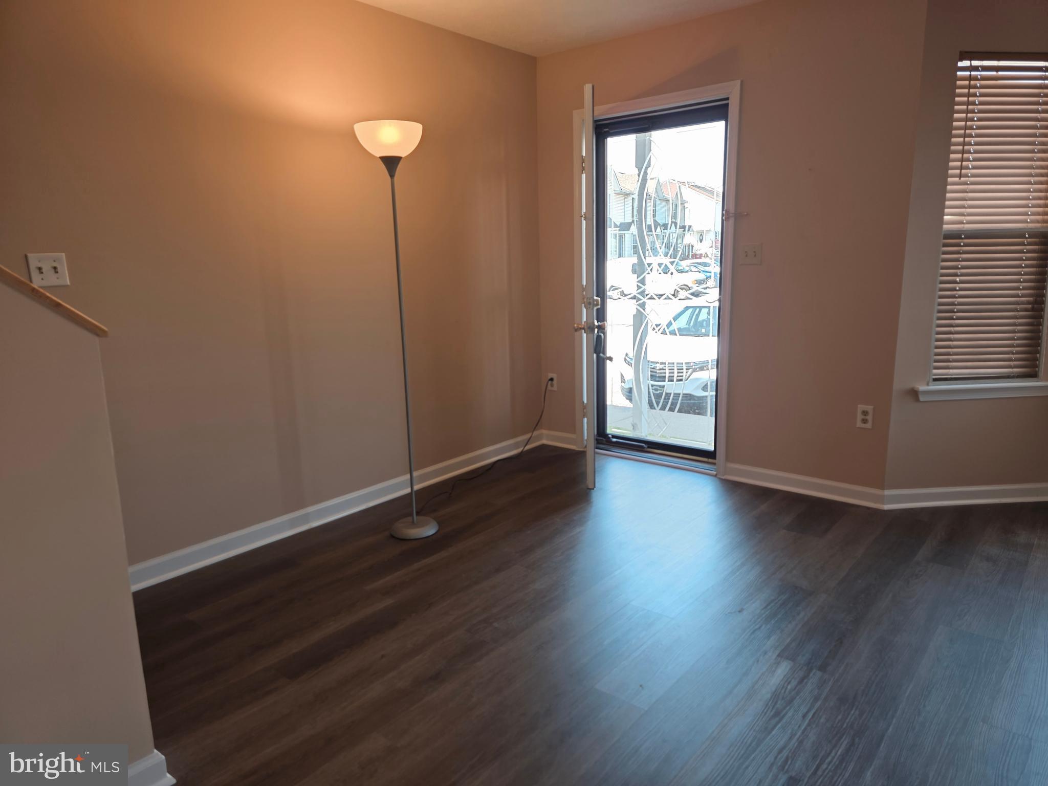 80 Stadium Circle Inwood, WV 25428 - Photo 35 of 53 an empty room with wooden floor and windows