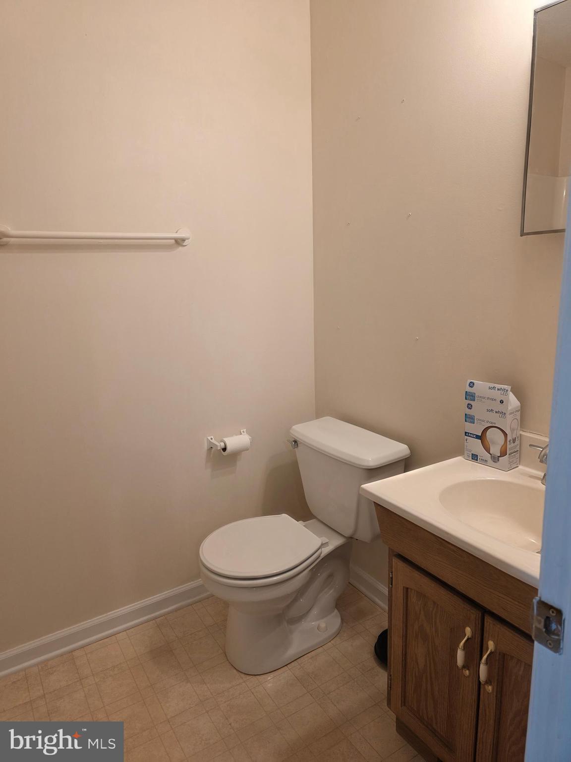80 Stadium Circle Inwood, WV 25428 - Photo 39 of 53 a bathroom with a sink a toilet and a mirror