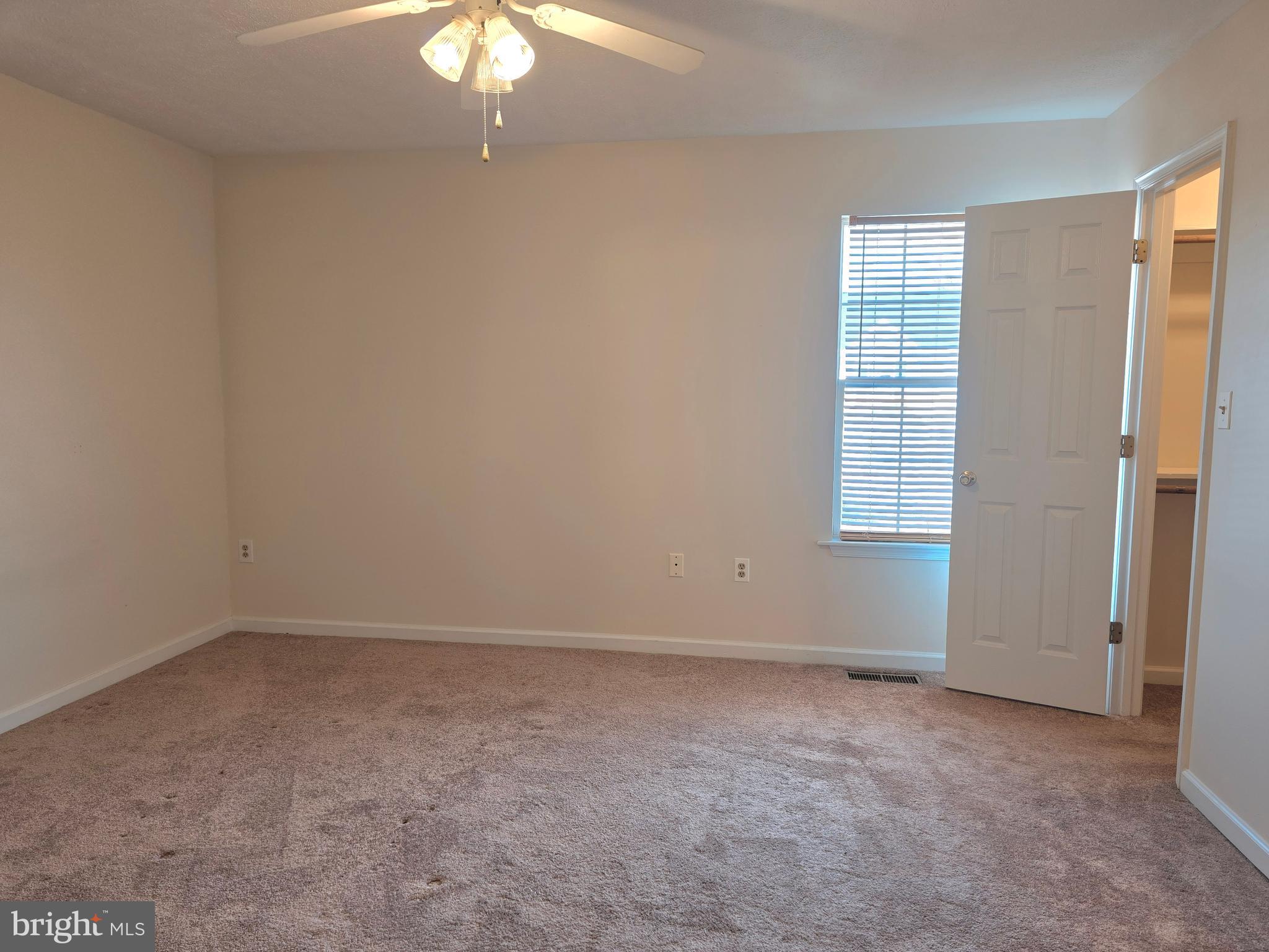 80 Stadium Circle Inwood, WV 25428 - Photo 41 of 53 wooden floor in an empty room with a window
