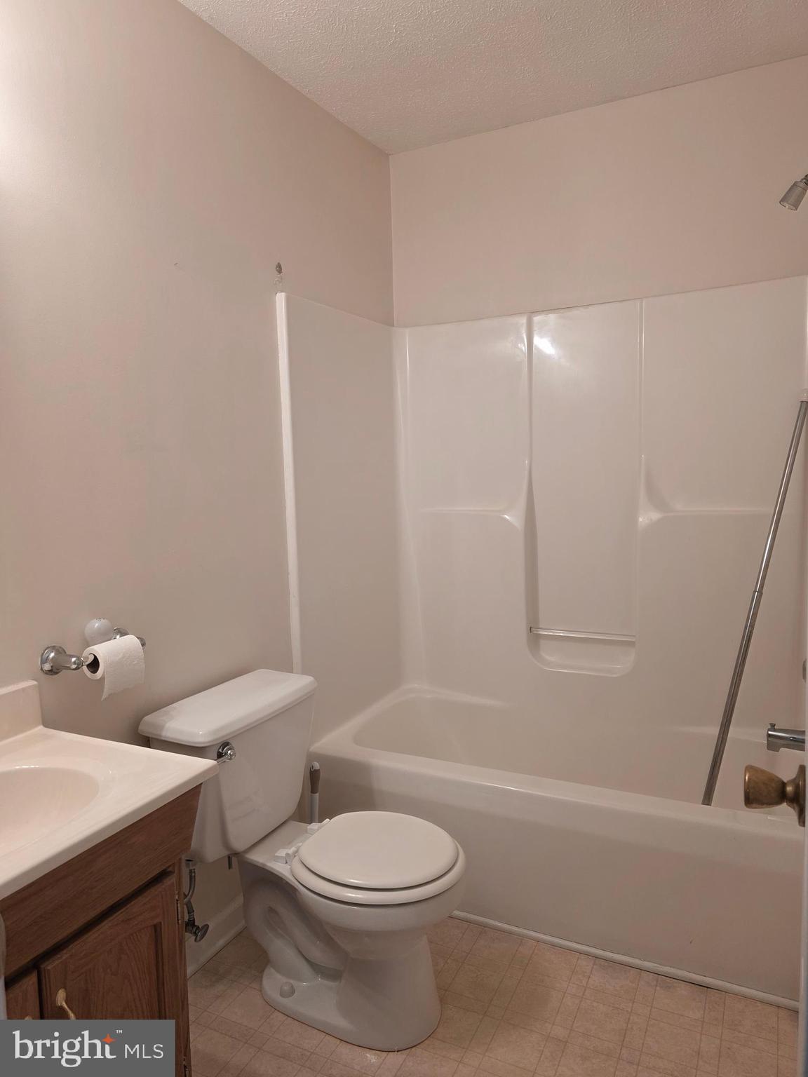 80 Stadium Circle Inwood, WV 25428 - Photo 46 of 53 a white toilet sitting next to a bath tub