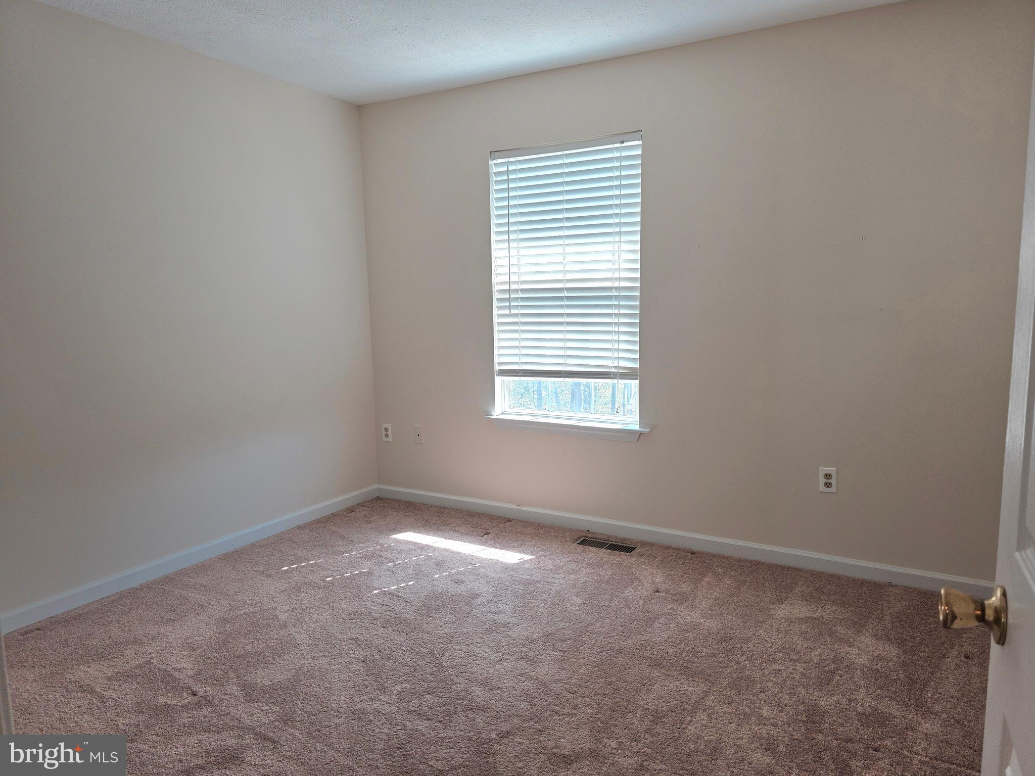 80 Stadium Circle Inwood, WV 25428 - Photo 50 of 53 an empty room with a window