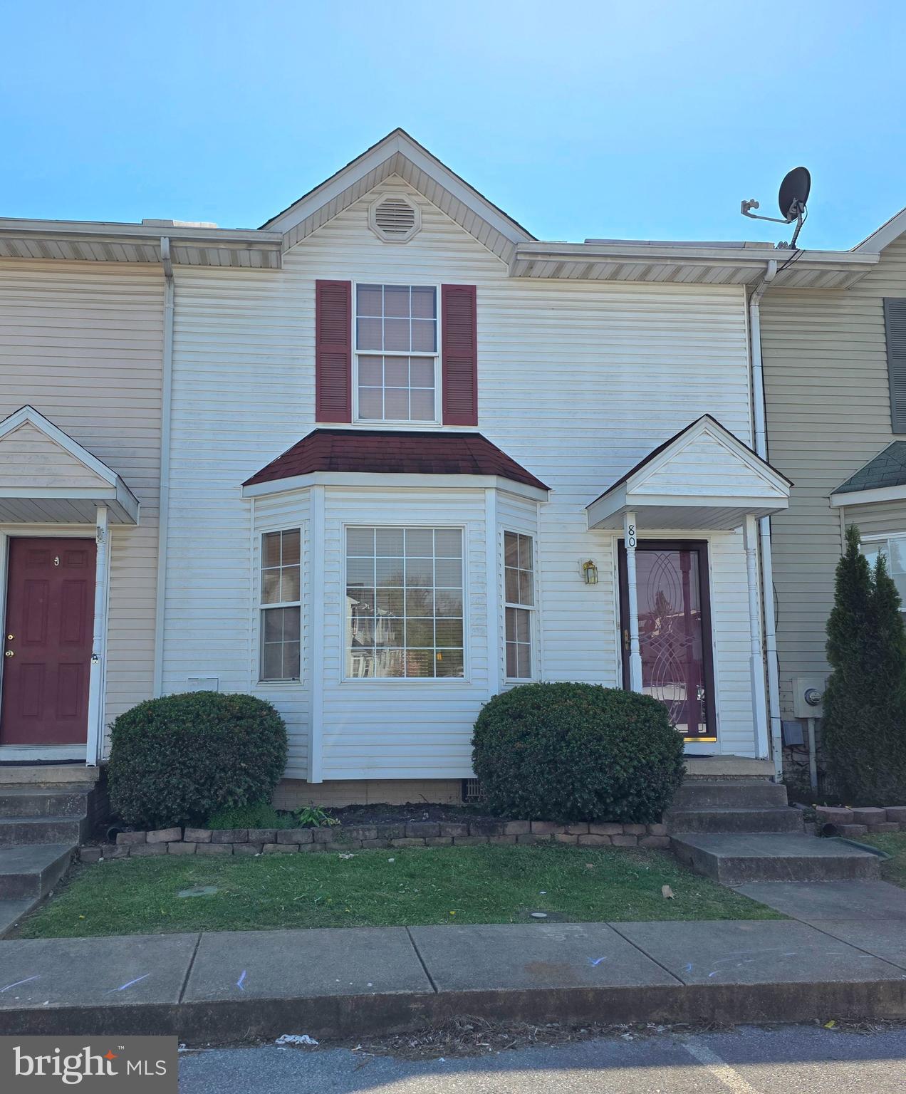 80 Stadium Circle Inwood, WV 25428 - Photo 5 of 53 a front view of a house with a yard