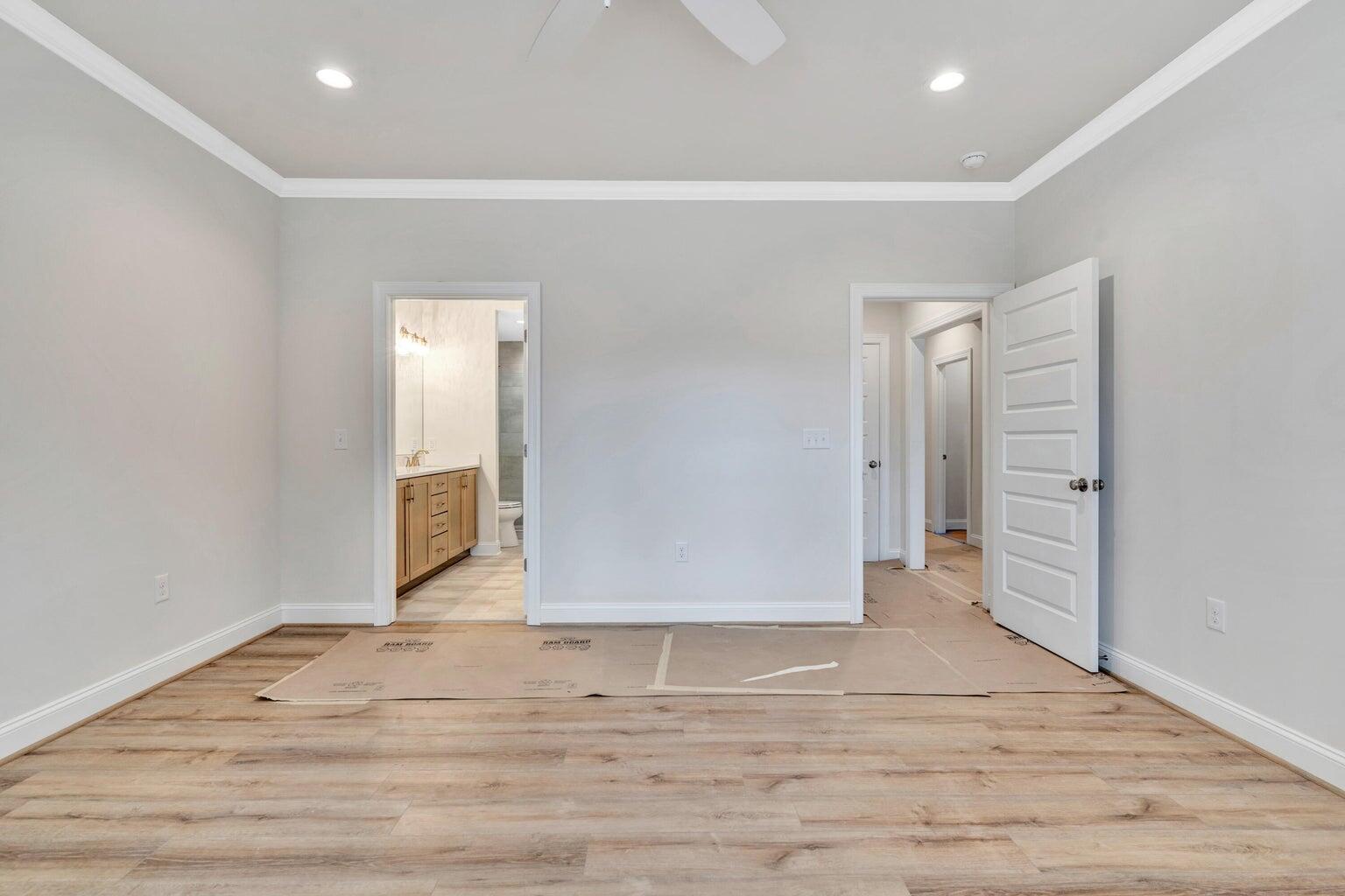 562 Dillard Road Southwest Roanoke, VA 24014 - Photo 8 of 13 a view of an empty room with wooden floor and closet