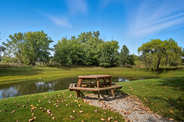 a view of a lake with a outdoor space