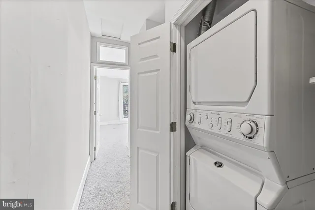 a view of a hallway with staircase