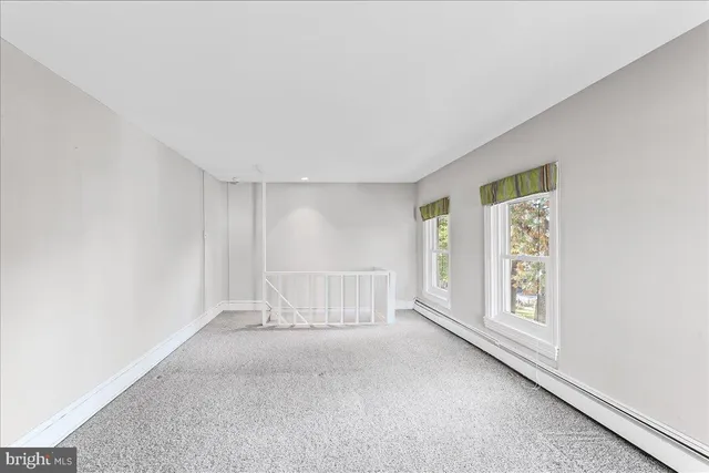 a view of street with large building