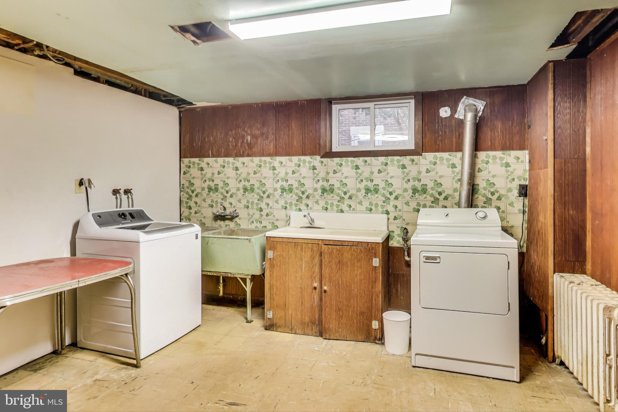 4401 32nd Street Mount Rainier, MD 20712 - Photo 26 of 38 a utility room with dryer and washer