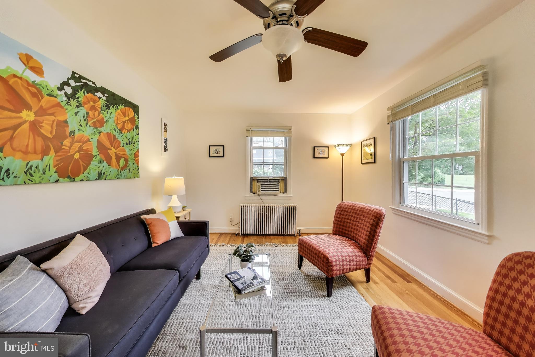 4401 32nd Street Mount Rainier, MD 20712 - Photo 5 of 38 a living room with furniture and a window