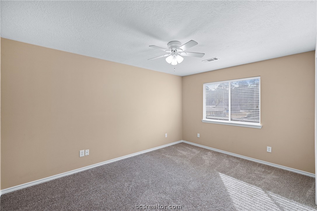70 Lakeside Drive Trinity, TX 75862 - Photo 18 of 34 wooden floor in an empty room with a window