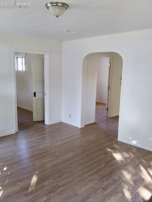 403 8th Street Fowler, CO 81039 - Photo 2 of 13 a view of empty room with wooden floor