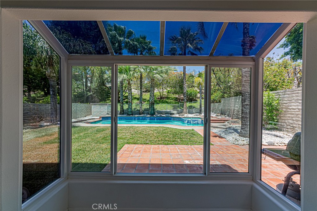 25533 Longfellow Place Stevenson Ranch, CA 91381 - Photo 11 of 47 a view of a porch and garden