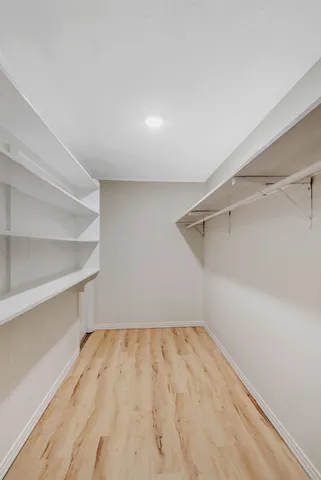 a view of a room with walk in closet