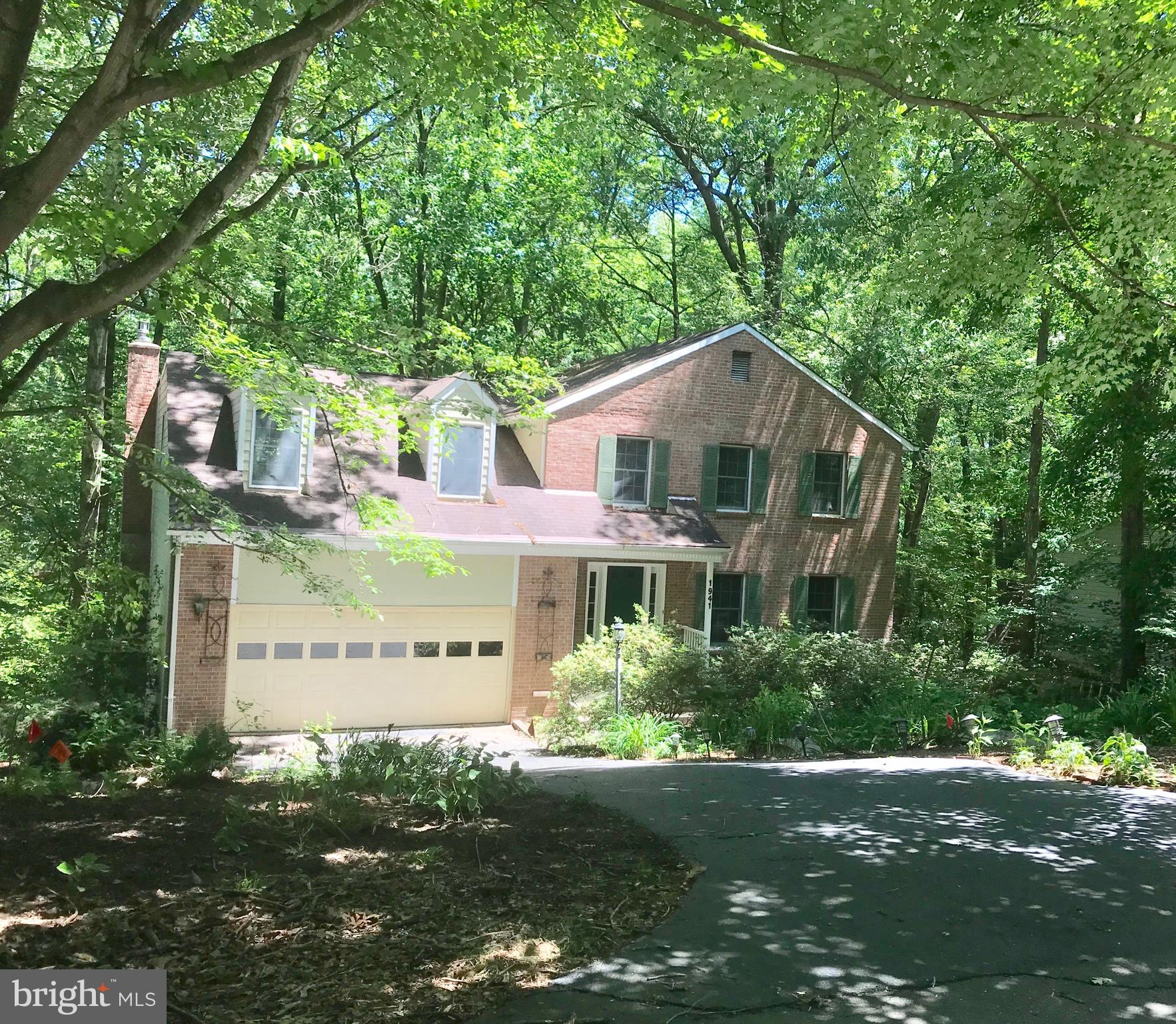 1941 Barton Hill Road Reston, VA 20191 - Photo 1 of 38 Front exterior, with 2 car garage