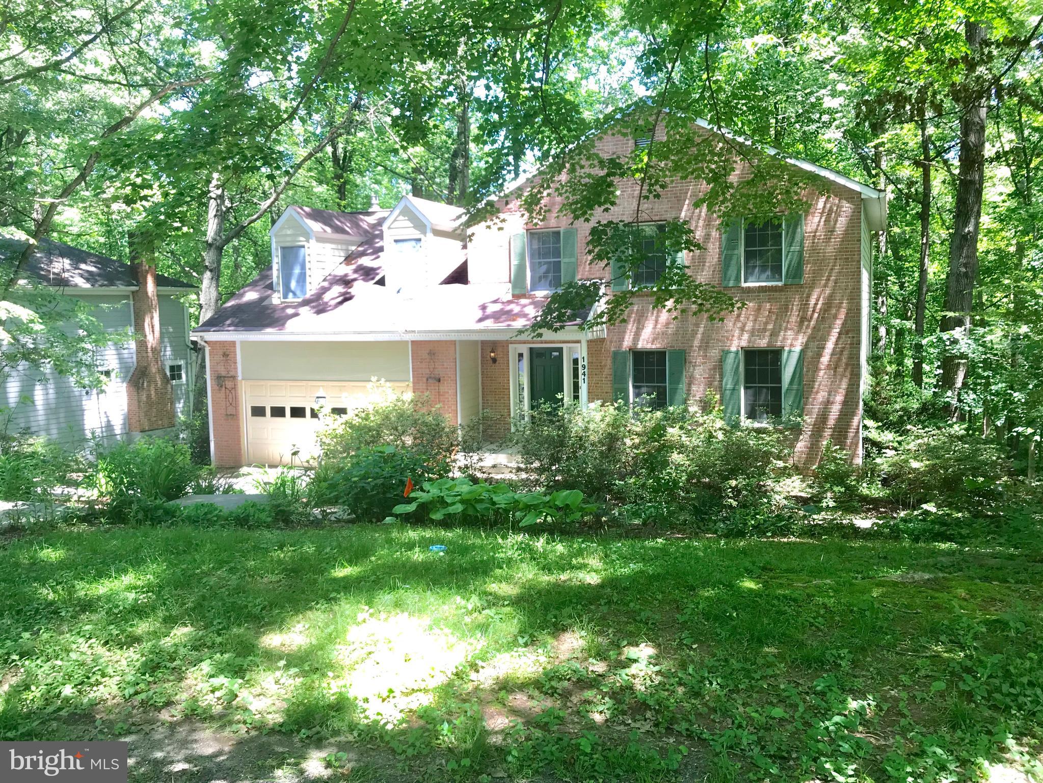 1941 Barton Hill Road Reston, VA 20191 - Photo 2 of 38 Front exterior, with 2 car garage