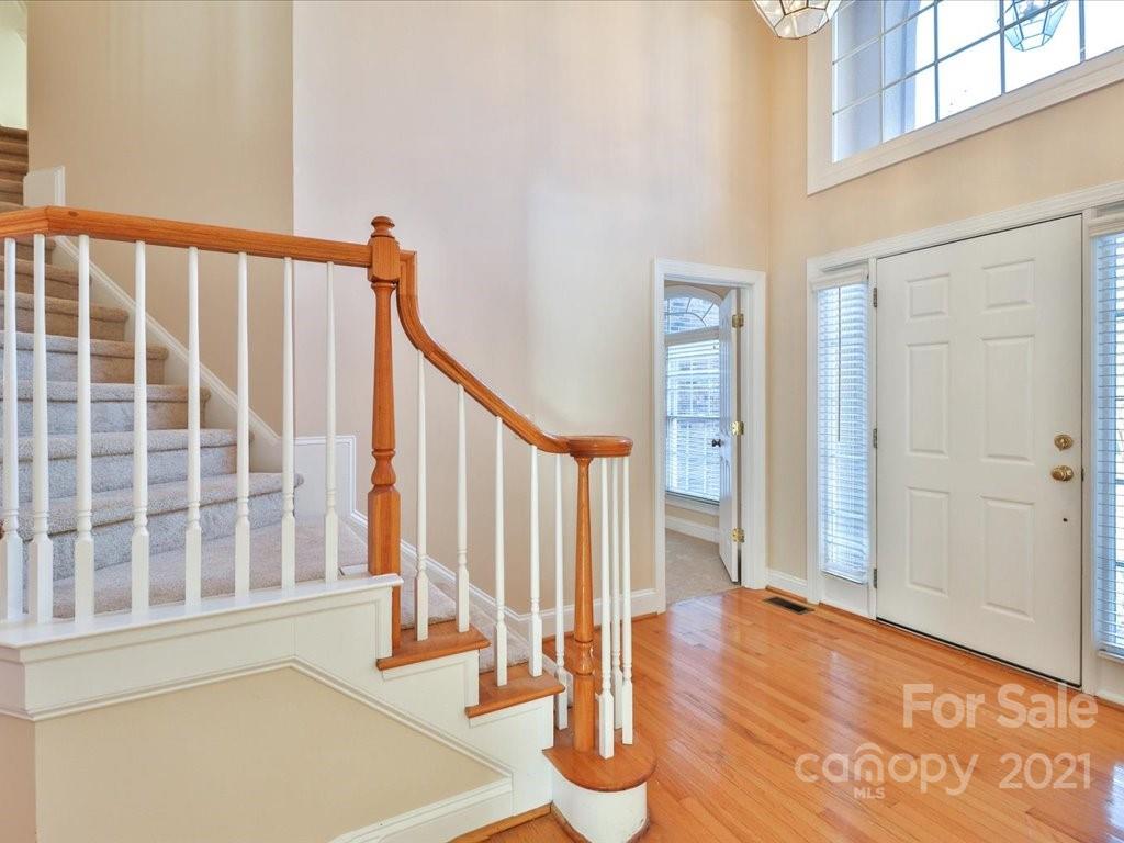 3426 Rhett Butler Place Charlotte, NC 28270 - Photo 2 of 40 a view of an entryway with staircase