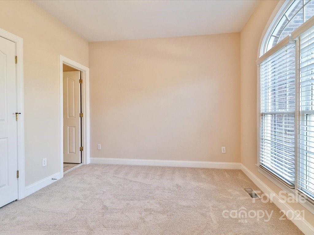3426 Rhett Butler Place Charlotte, NC 28270 - Photo 18 of 40 a view of an empty room with a window