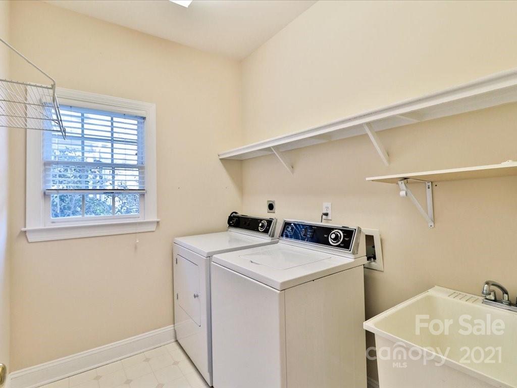 3426 Rhett Butler Place Charlotte, NC 28270 - Photo 21 of 40 a utility room with dryer and washer