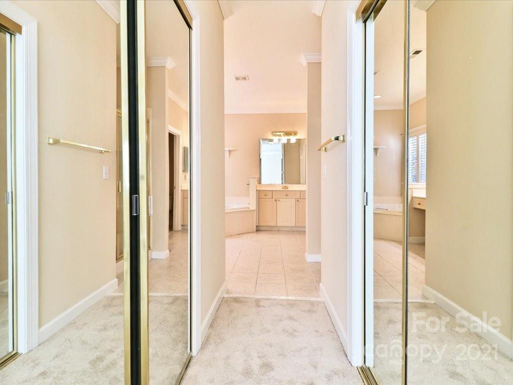 3426 Rhett Butler Place Charlotte, NC 28270 - Photo 26 of 40 a view of a bathroom with a glass door and a glass door