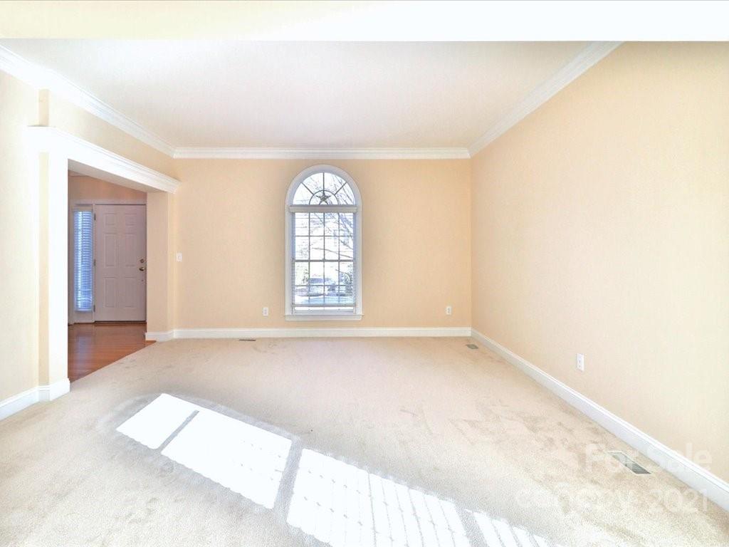 3426 Rhett Butler Place Charlotte, NC 28270 - Photo 4 of 40 an empty room with windows