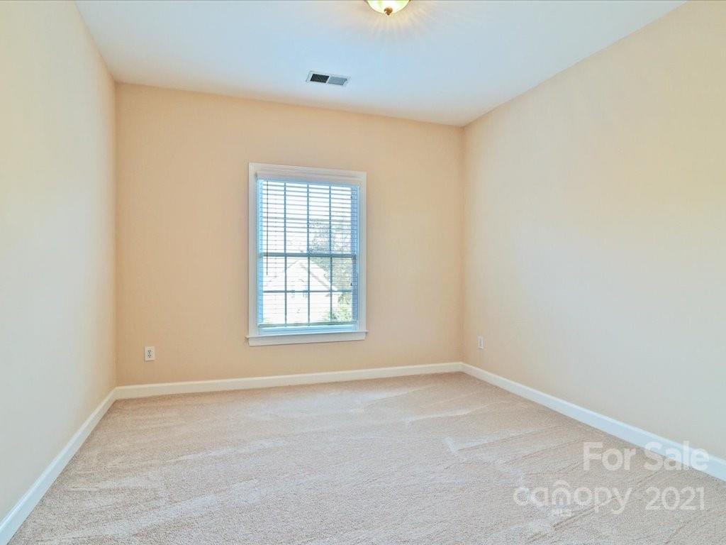 3426 Rhett Butler Place Charlotte, NC 28270 - Photo 31 of 40 an empty room with a window