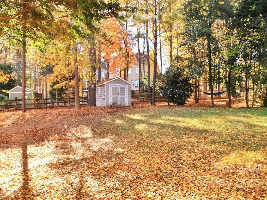 3426 Rhett Butler Place Charlotte, NC 28270 - Photo 38 of 40 a view of a house with a yard