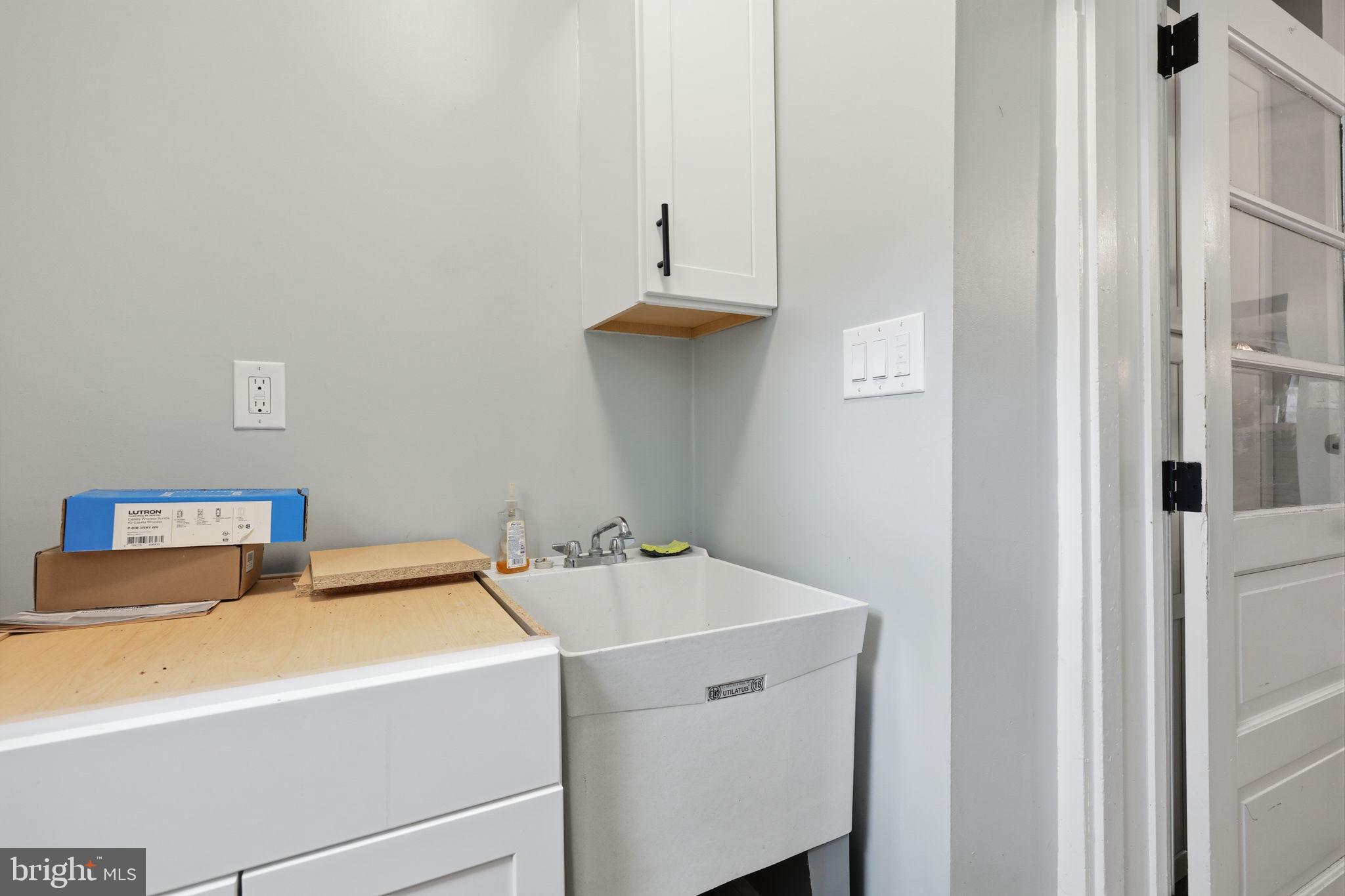 353 Hermitage Street Philadelphia, PA 19128 - Photo 13 of 31 a utility room with dryer and washer