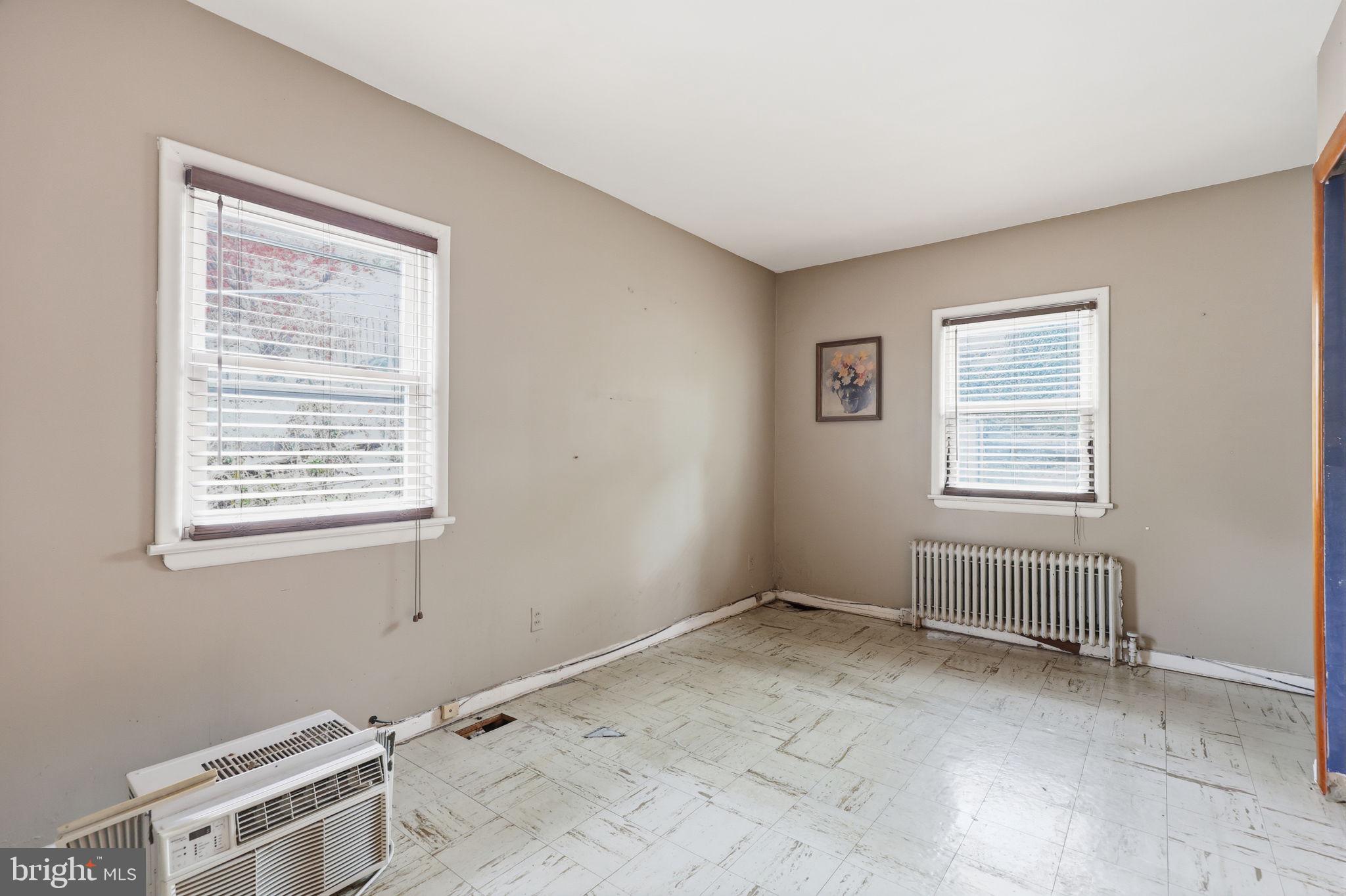 353 Hermitage Street Philadelphia, PA 19128 - Photo 15 of 31 a view of an empty room with a window