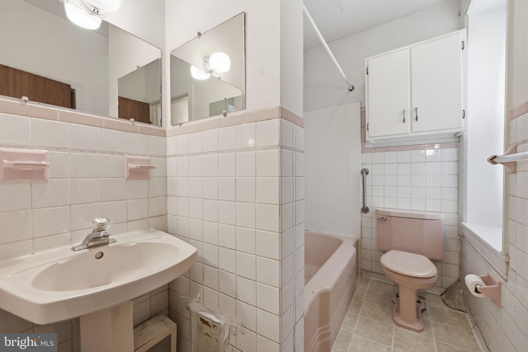 353 Hermitage Street Philadelphia, PA 19128 - Photo 18 of 31 a bathroom with a sink toilet and shower
