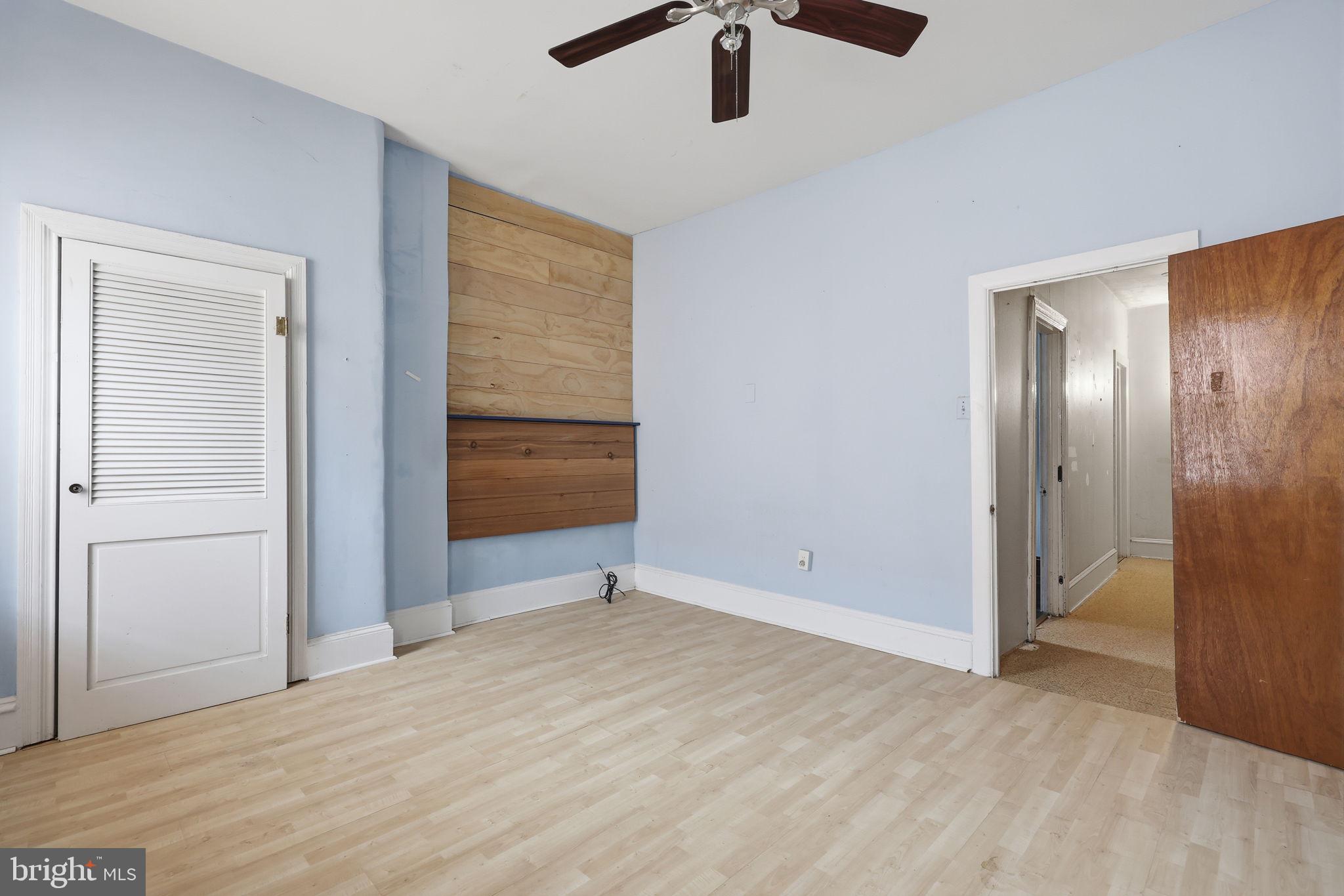 353 Hermitage Street Philadelphia, PA 19128 - Photo 21 of 31 an empty room with closet and windows