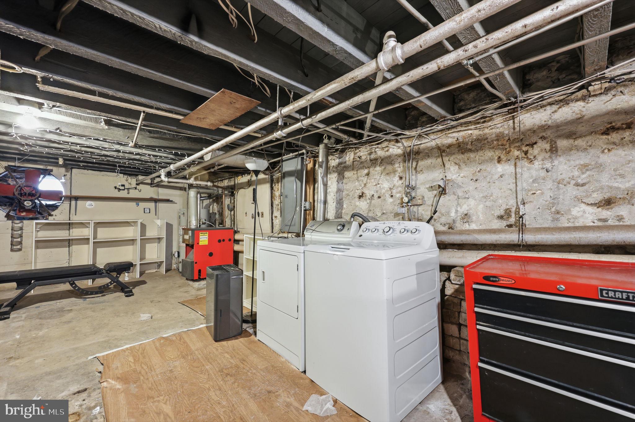 353 Hermitage Street Philadelphia, PA 19128 - Photo 25 of 31 a utility room with dryer and washer