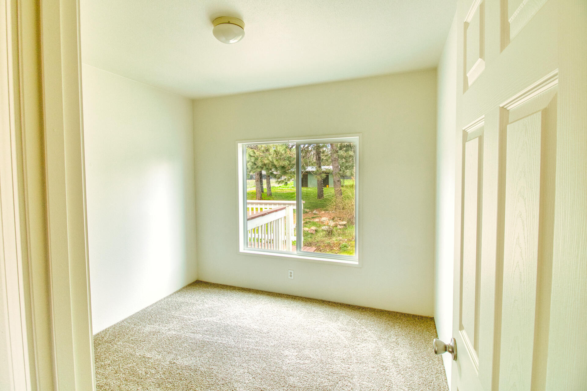 4767 Holland Loop Road Cave Junction, OR 97523 - Photo 18 of 29 guest bedroom 1