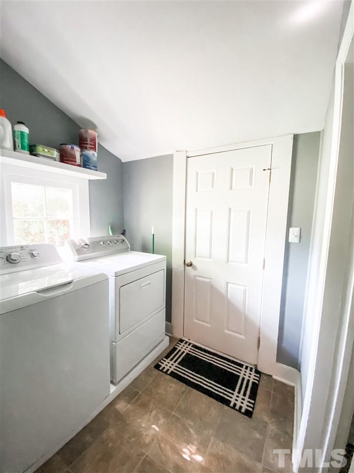 910 Gilbert Street Durham, NC 27701 - Photo 15 of 24 a room with a washing machine