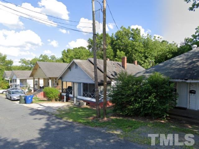 910 Gilbert Street Durham, NC 27701 - Photo 5 of 24 a front view of a house with garden