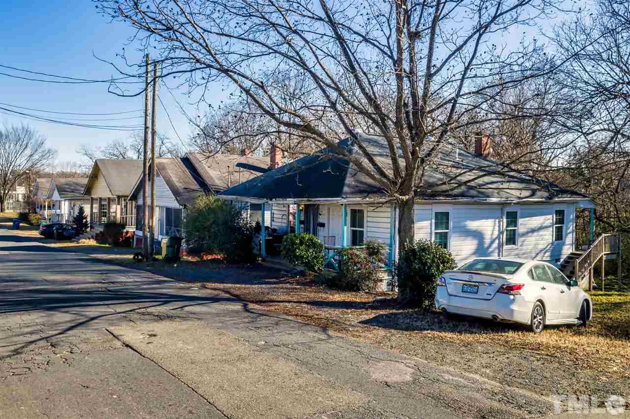 910 Gilbert Street Durham, NC 27701 - Photo 6 of 24 a front view of a house with cars parked