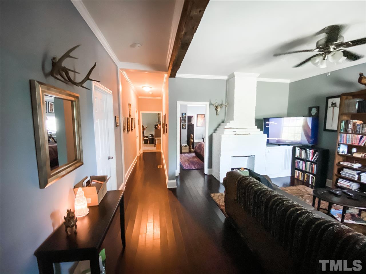 910 Gilbert Street Durham, NC 27701 - Photo 8 of 24 a living room with furniture and a wooden floor
