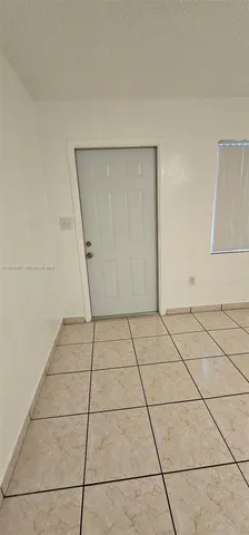 a view of a utility room with empty racks