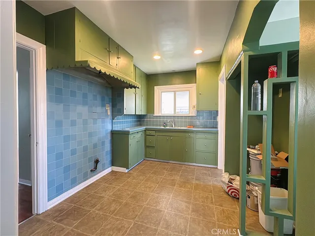 a bathroom with a mirror and a shower