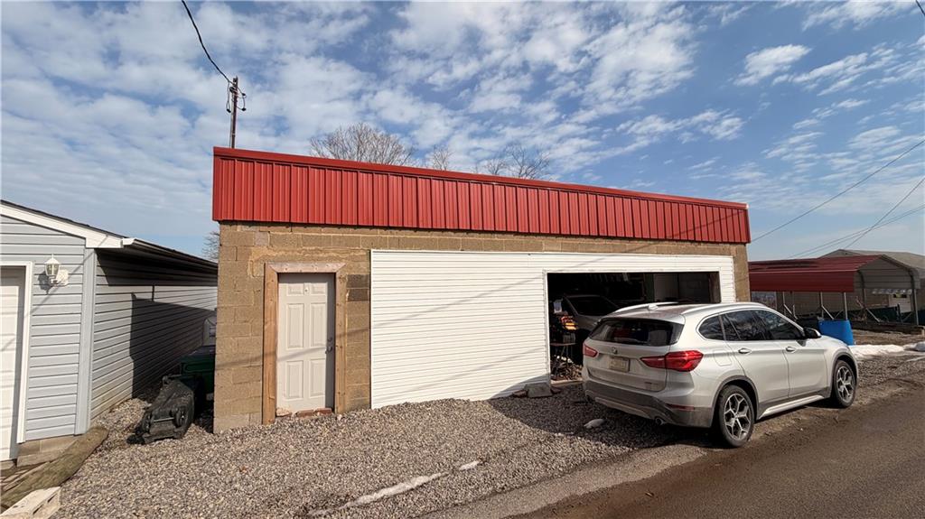 327 Lowell Street Vandergrift, PA 15690 - Photo 16 of 16 a view of a car park in front of house