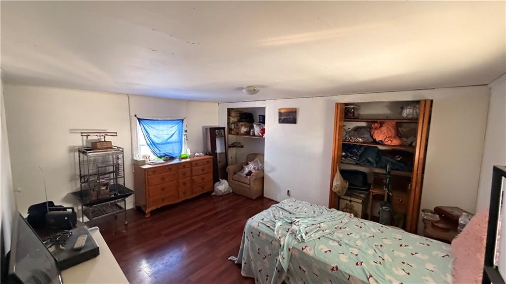 327 Lowell Street Vandergrift, PA 15690 - Photo 10 of 16 a bedroom with furniture and a window