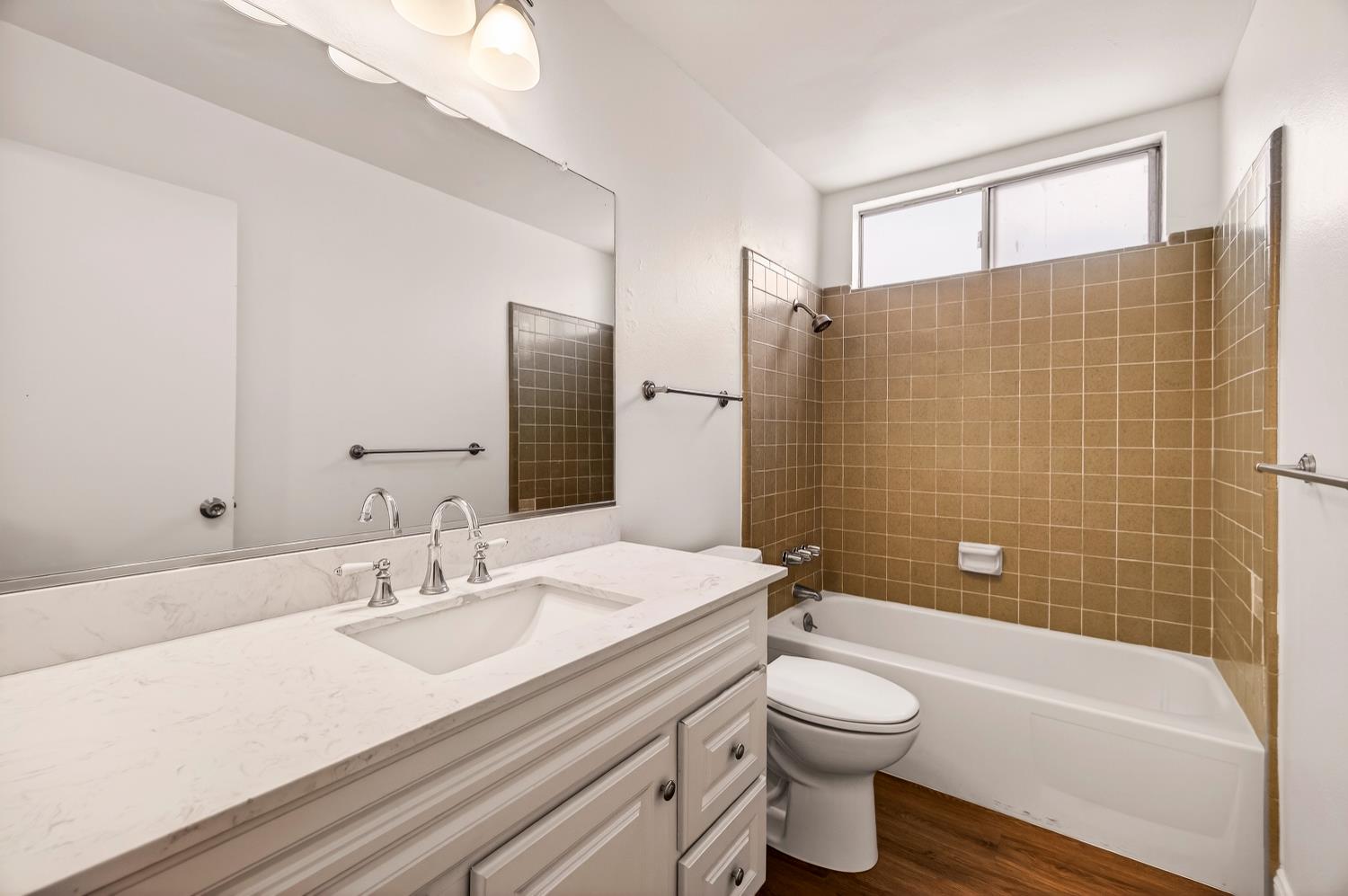 615 Rancheria Drive Chico, CA 95926 - Photo 23 of 80 a bathroom with a sink a toilet and shower